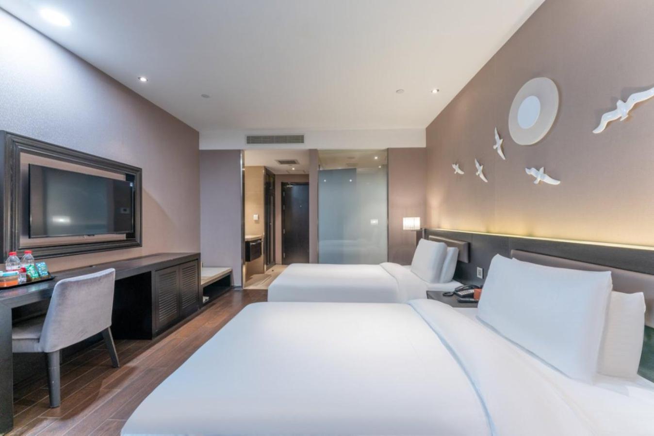 Orange Shenjiang South Road Hotel 4*